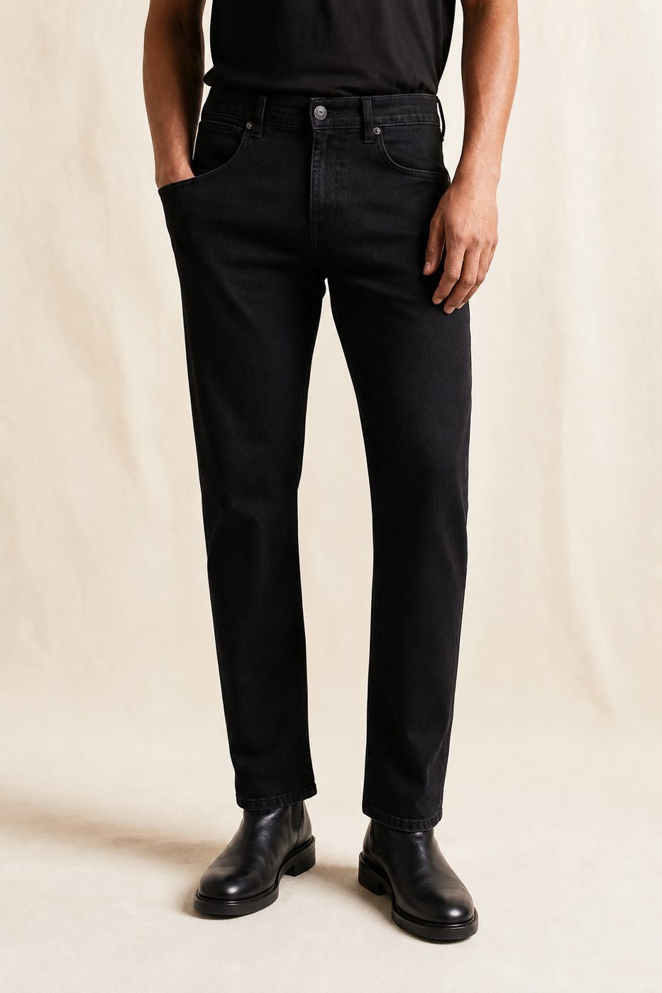 Man wearing black denim jeans